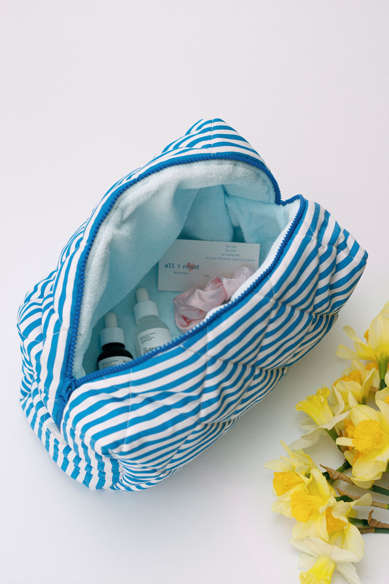How to Create a Vacation Beauty Bag with Only the Products You Truly Need