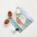 Sunglasses and skincare products arranged for a summer day